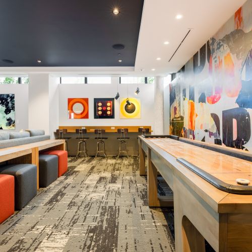 Unleash your competitive spirit with a game of table shuffleboard