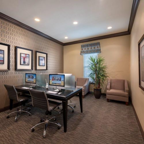 Catch up with work in the Mac®-powered business center with printing station.