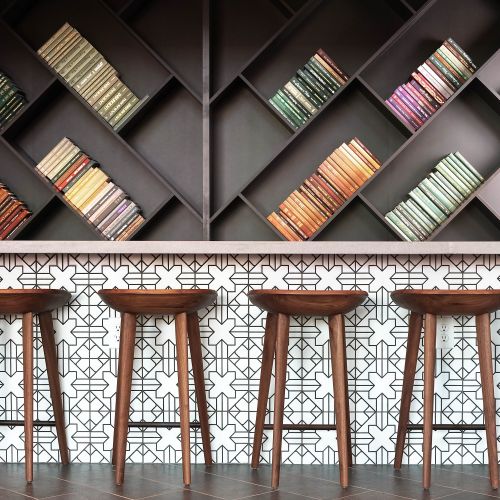 Share a drink with your neighbor in the East tower's high top bar