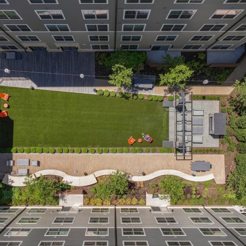 Secluded courtyard boasting a fireplace, sun deck and copious amounts of seating