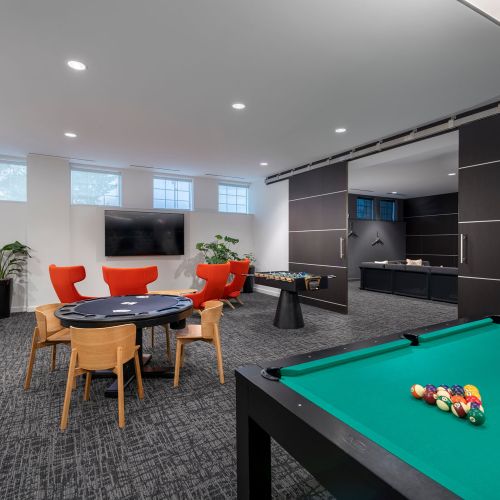 Soar into your competitive spirit with a game of billiards, poker or foosball