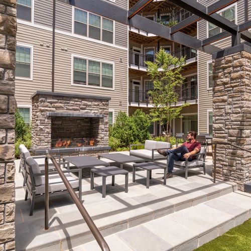 Gather with friends around the outdoor fireplace