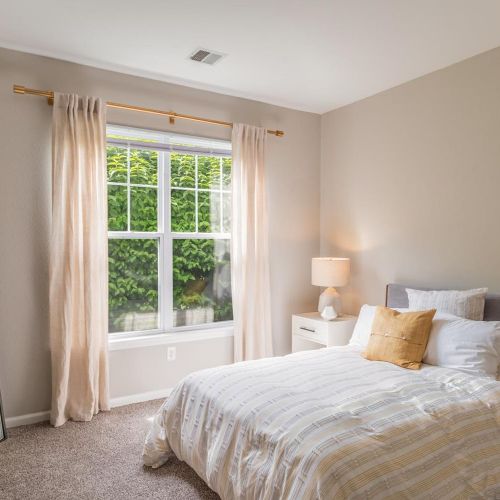 Spacious bedrooms with oversized windows allow for plenty of natural light