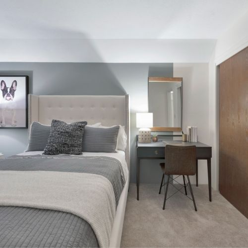 Bedroom With Desk And Closet