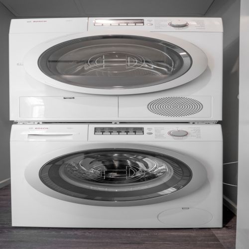 Washer and dryer in apartments.