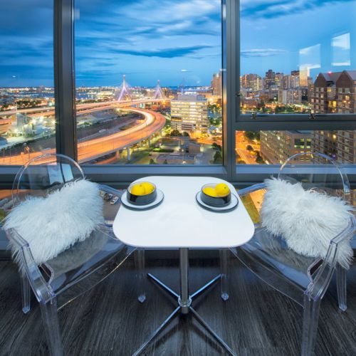 Evening view of interior penthouse model.