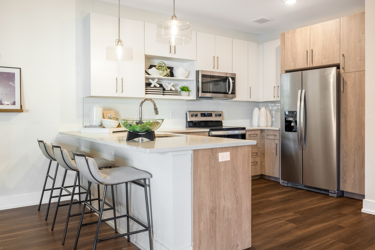 Compass at The Grove : Sleek contemporary cabinetry with modern stainless steel appliances
