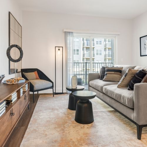 Luxury plank flooring in living areas with berber carpeted bedrooms