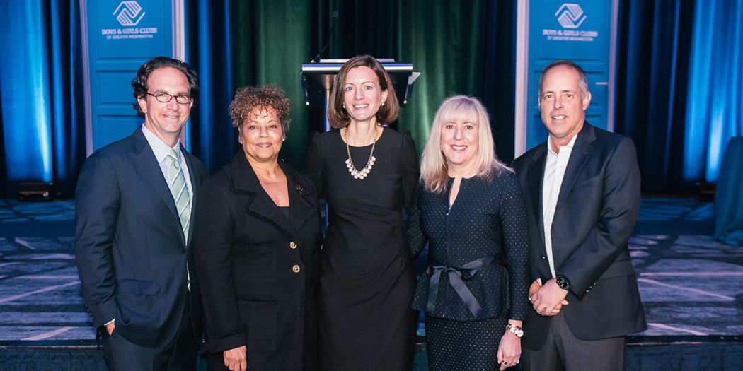 Bozzuto Chairman Toby Bozzuto posing with the representatives of The Boys and Girls Clubs of Greater Washington.
