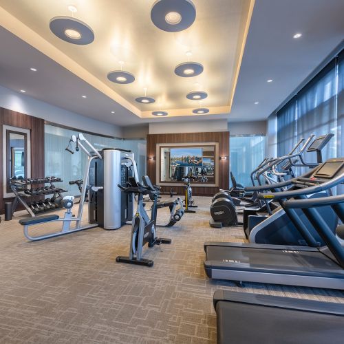 On-site 24-hour fitness center with tablet-integrated cardio machines