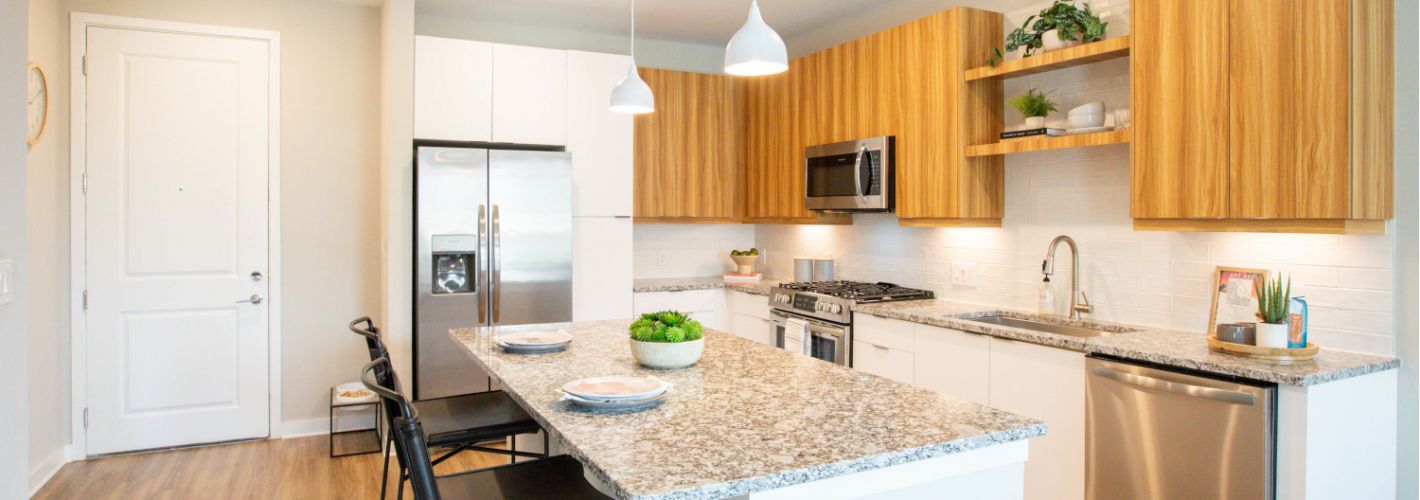 Alexan Summerhill : Hardwood-inspired flooring throughout residences.
