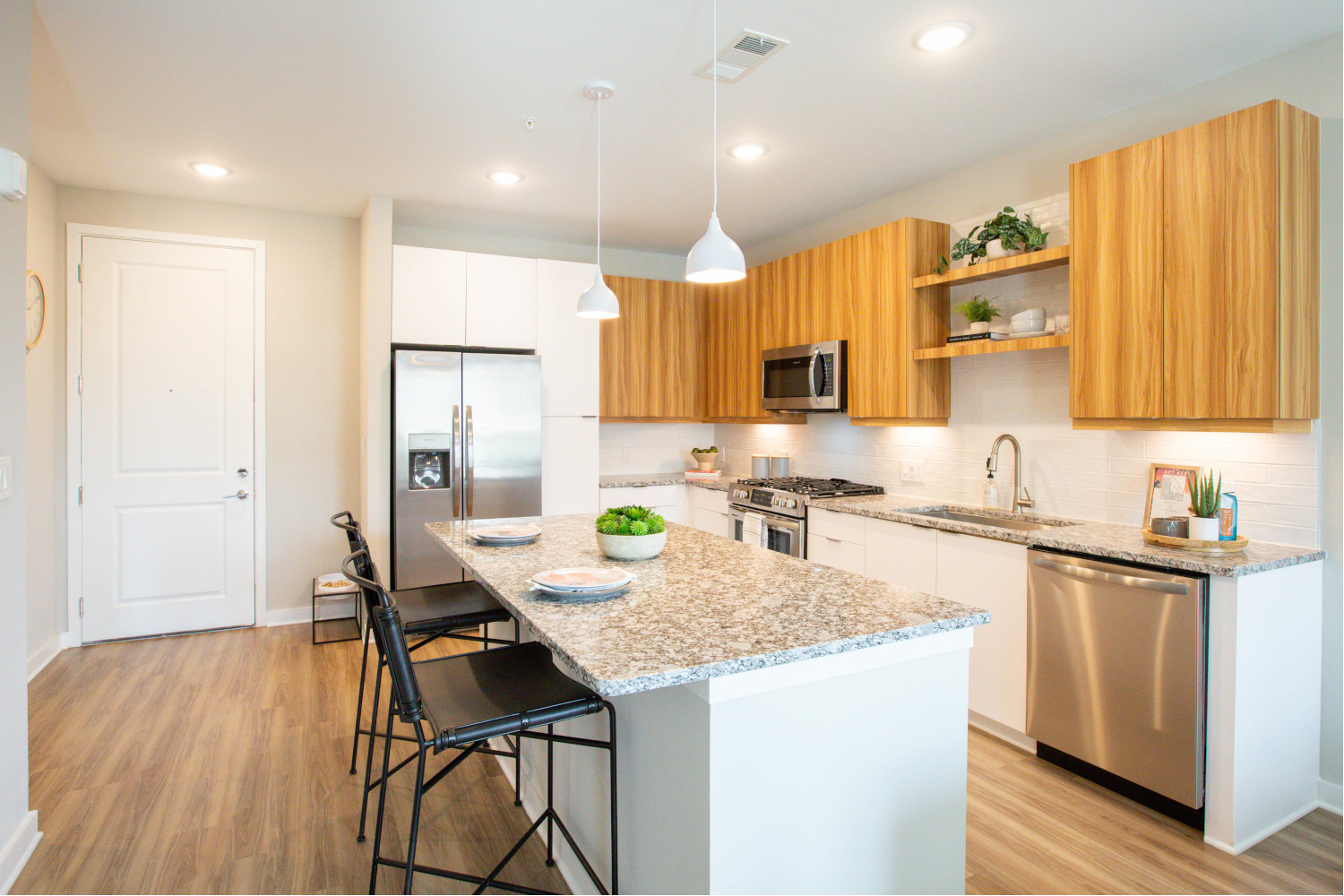 Alexan Summerhill : Hardwood-inspired flooring throughout residences.