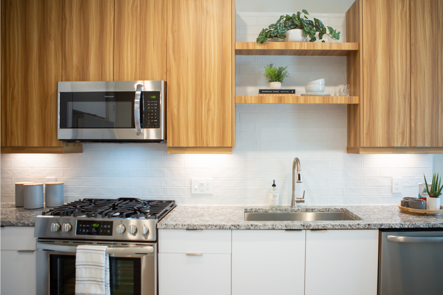 Alexan Summerhill : Kitchens featuring modern backsplash.