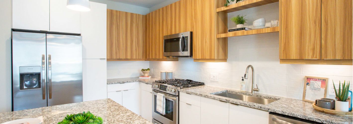 Alexan Summerhill : Chefs dream kitchens complete with granite countertops.