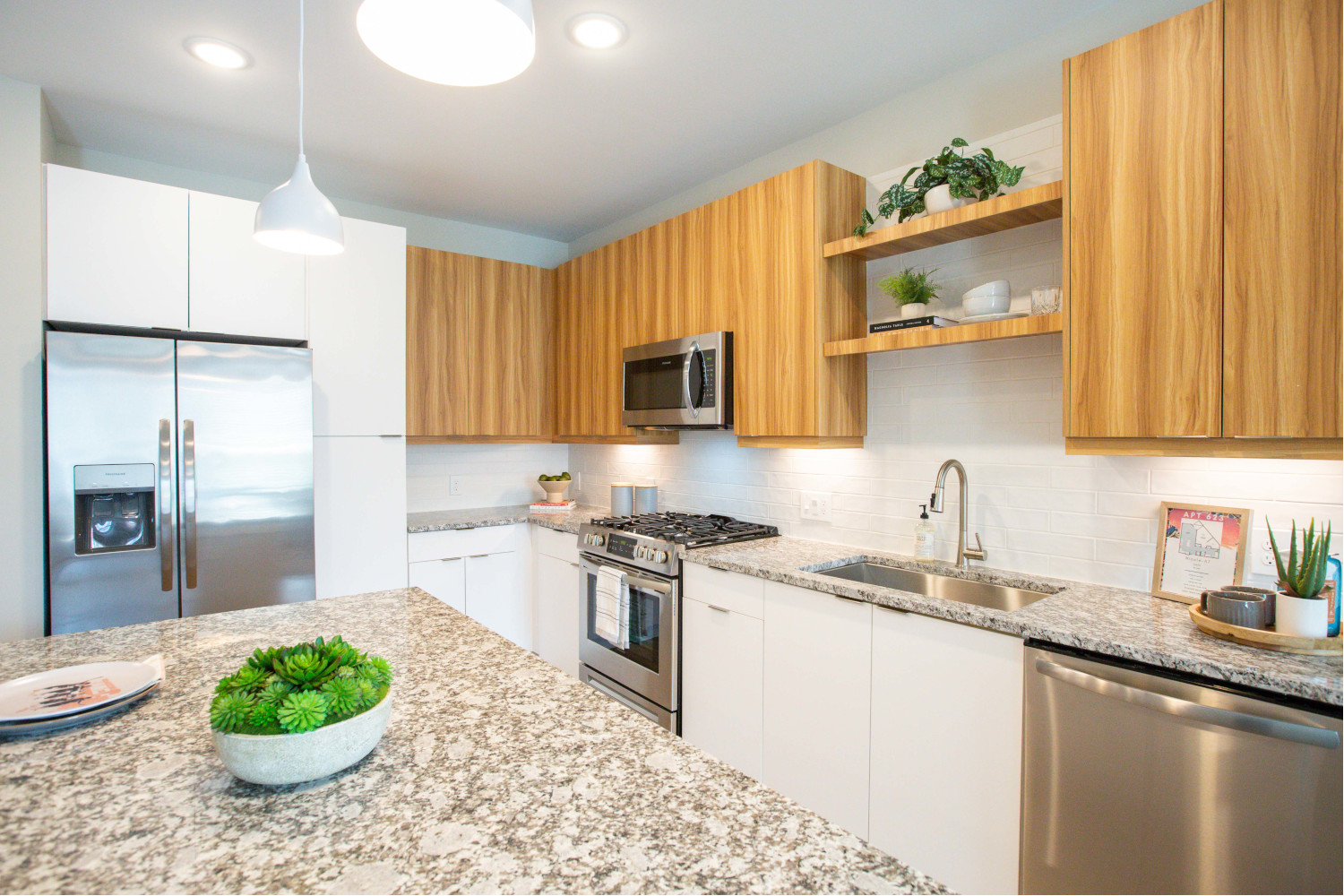 Alexan Summerhill : Chefs dream kitchens complete with granite countertops.