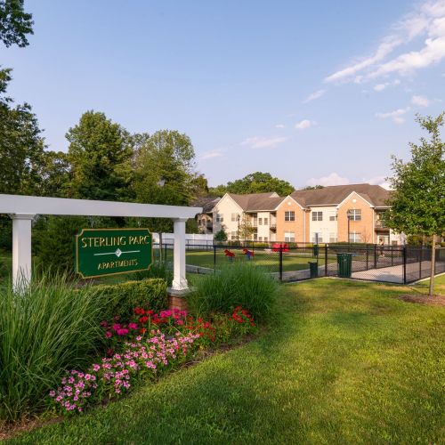 View of apartment building and sign