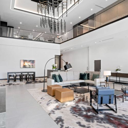 Bright, open space with soaring two-story ceilings, locally made artwork, elegant décor, and carefully crafted architectural details lobby