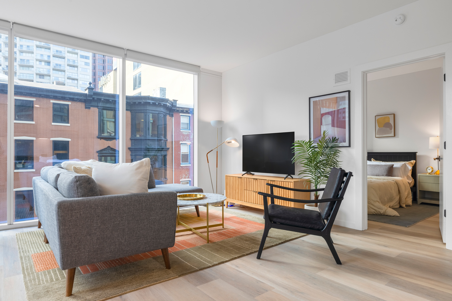 One Cathedral Square : Natural, warm wood look flooring throughout