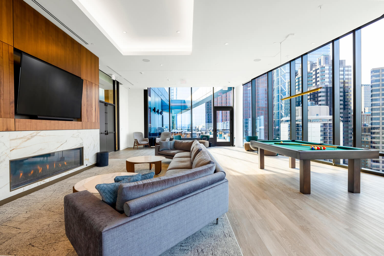 One Cathedral Square : Clubroom with TV, lounge seatings, and billiards