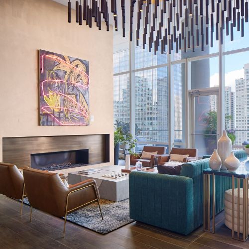 A cozy fireplace and seating area are perfect for conversation on cold winter nights. 