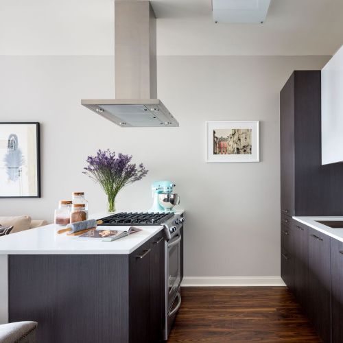 Expansive quartz countertops make entertaining easy. 