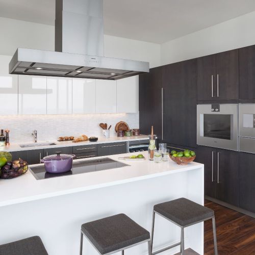 Designer penthouse kitchens are outfitted with Sub Zero amd Gaggenau appliances and wine coolers. 