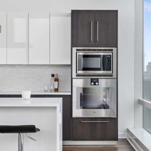 Exquisite penthouse apartments boast open floor plans, inspiring city views, designer kitchens with duotone cabinetry, and dozens of unique resident perks. 