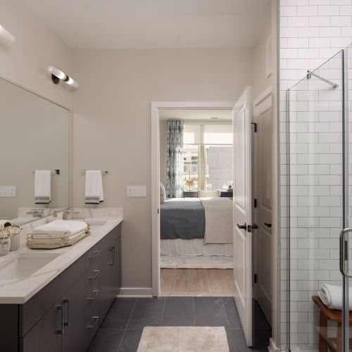 Quartz countertops with large format tile flooring