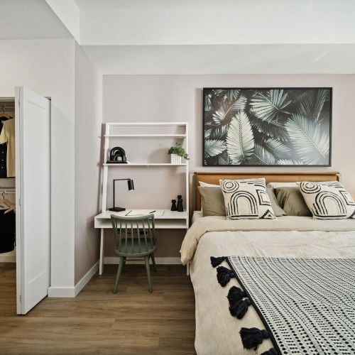 Bedroom with double rod storage closet