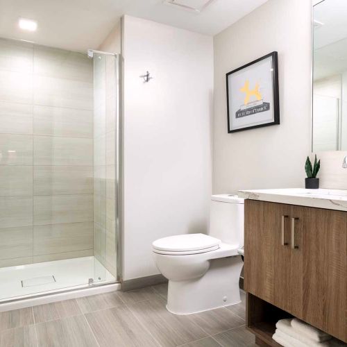 Slate backsplach accenting stainless-steel appliances and chrome fixtures