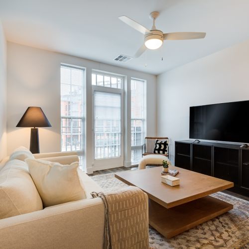 Living room with view of balcony	