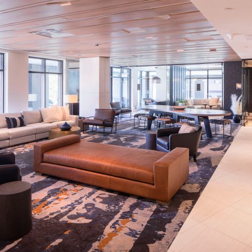 Business center with multiple seating areas	