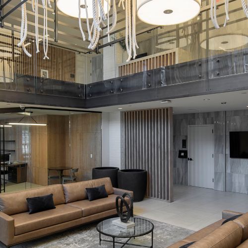 Lobby featuring stairway and beautiful chandelier 	