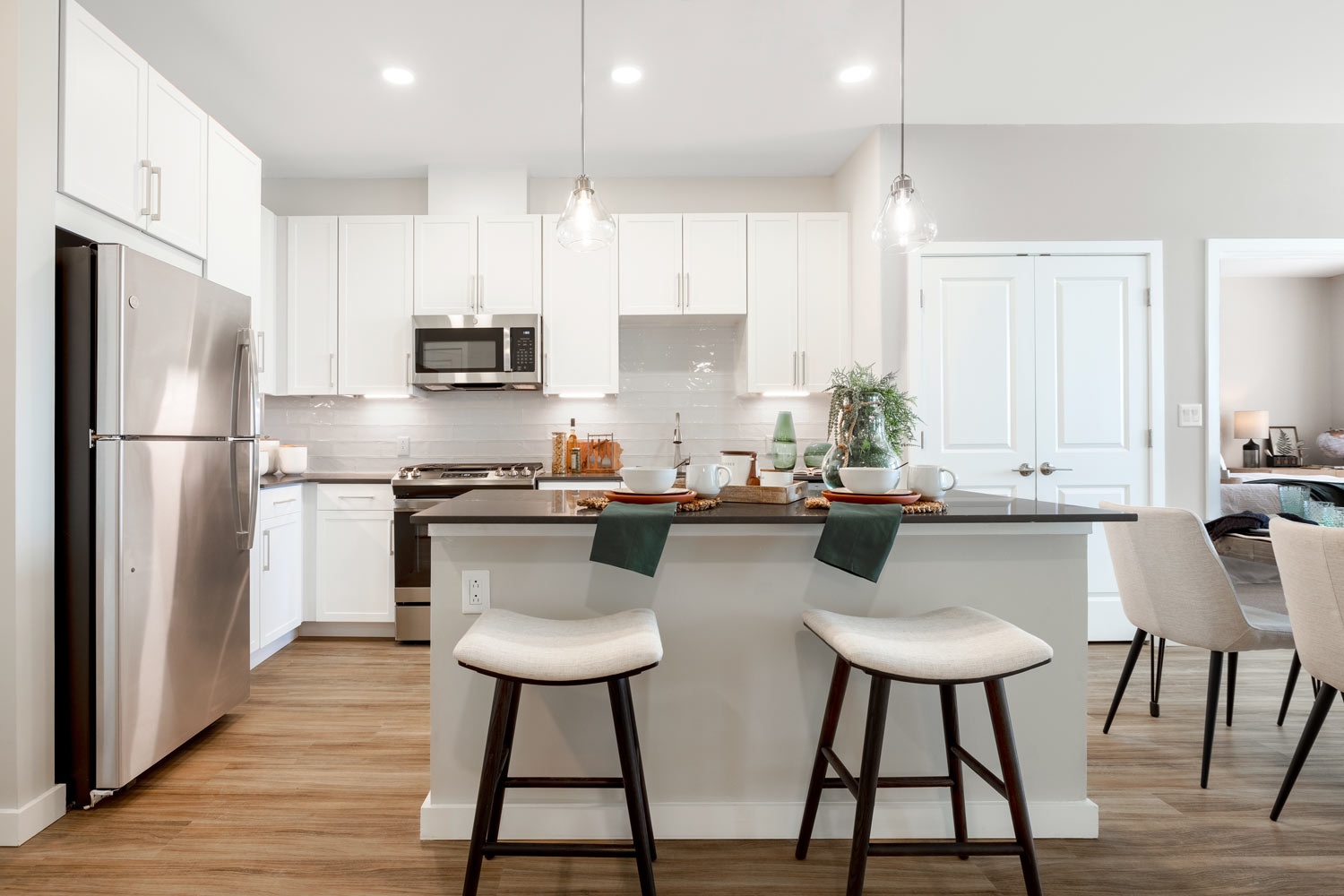 Parkside Providence Town Center : Quartz countertops and large islands with pendant lighting