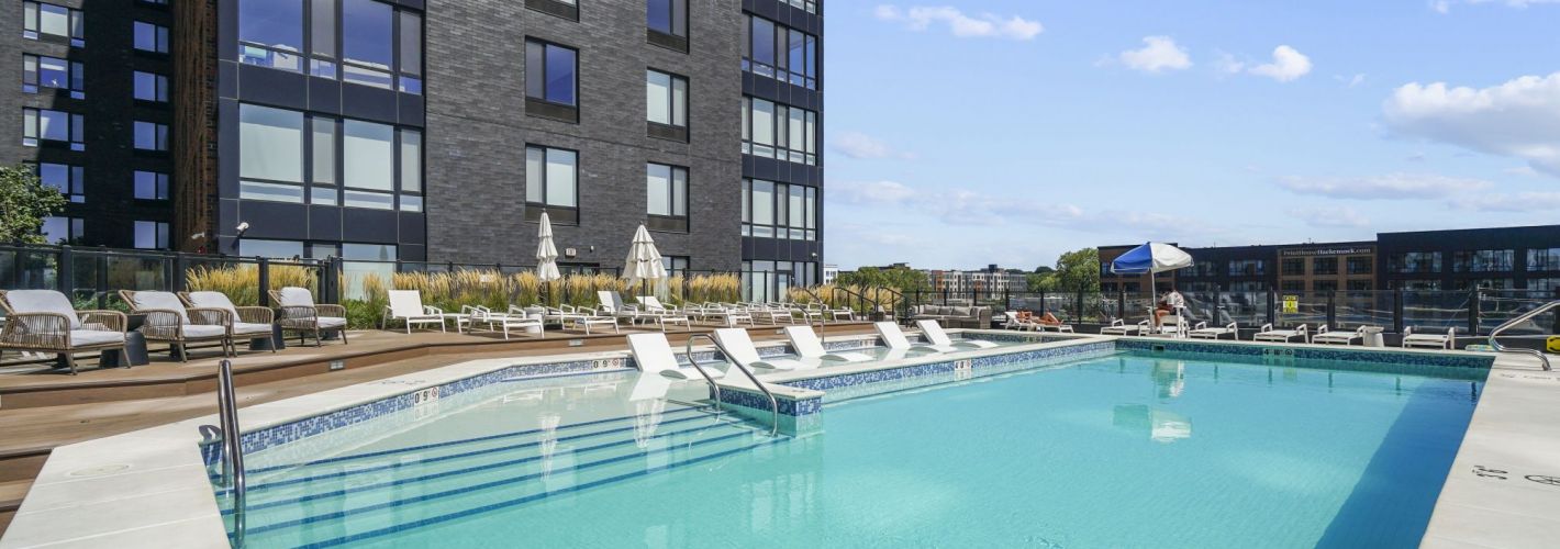 The Brick of Hackensack : Pool view with building view