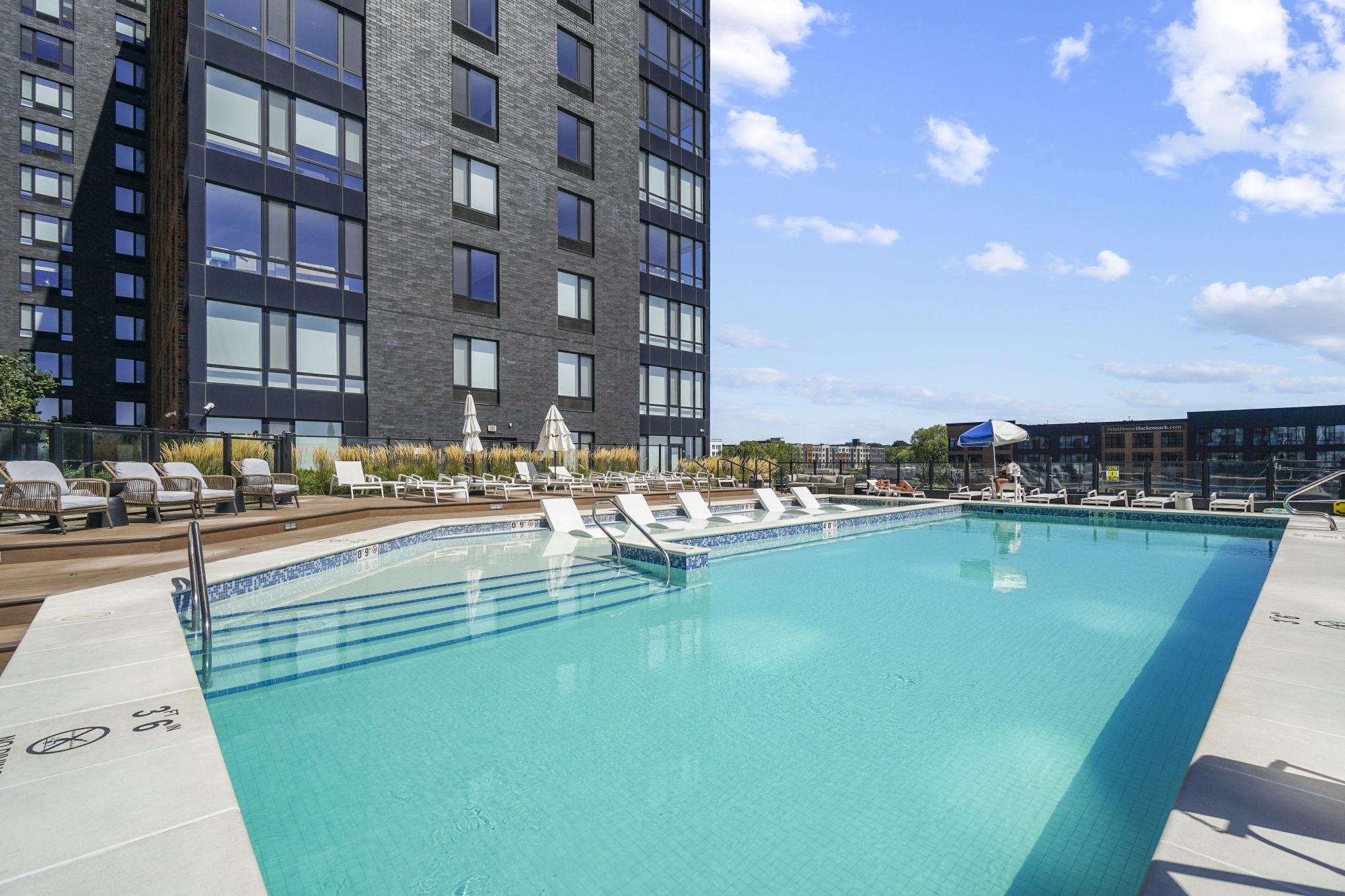 The Brick of Hackensack : Pool view with building view