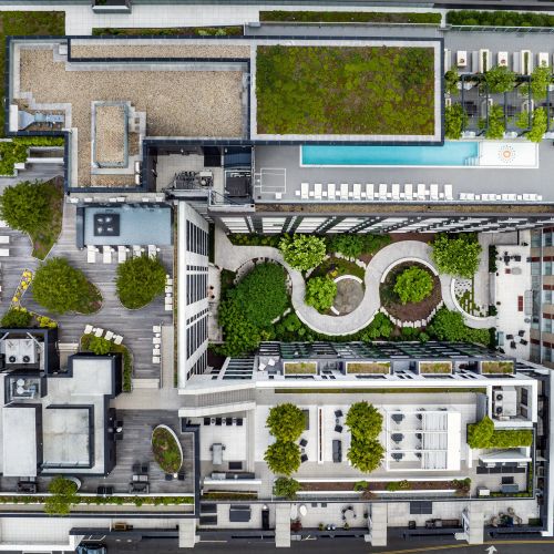 Expansive rooftop terraced with panoramic city views, a 60-foot pool, fire pits and versatiles spaces for gathering