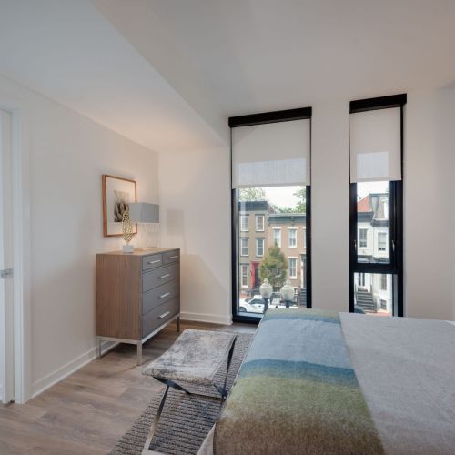 Spacious bedrooms with customizable closet systems