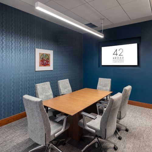 Conference room with coworking spaces