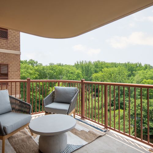 Private balconies connected to each home.