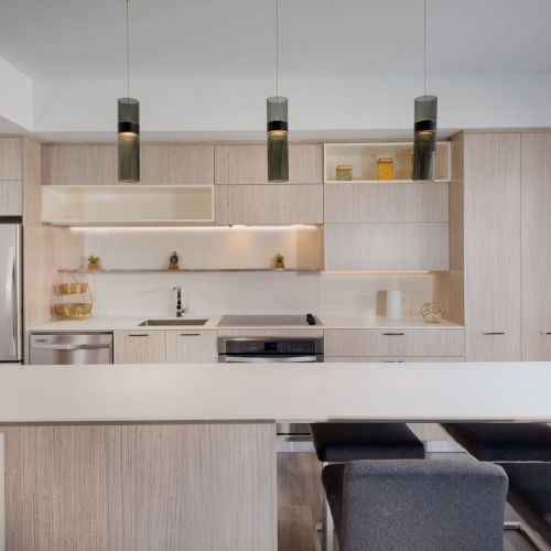 Exquisite kitchens featuring Italian cabinets, Corian countertops and porcelain tile backsplashes