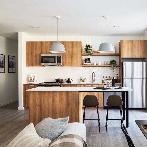 Chef-worthy kitchens with exansive islands and pendant lighting