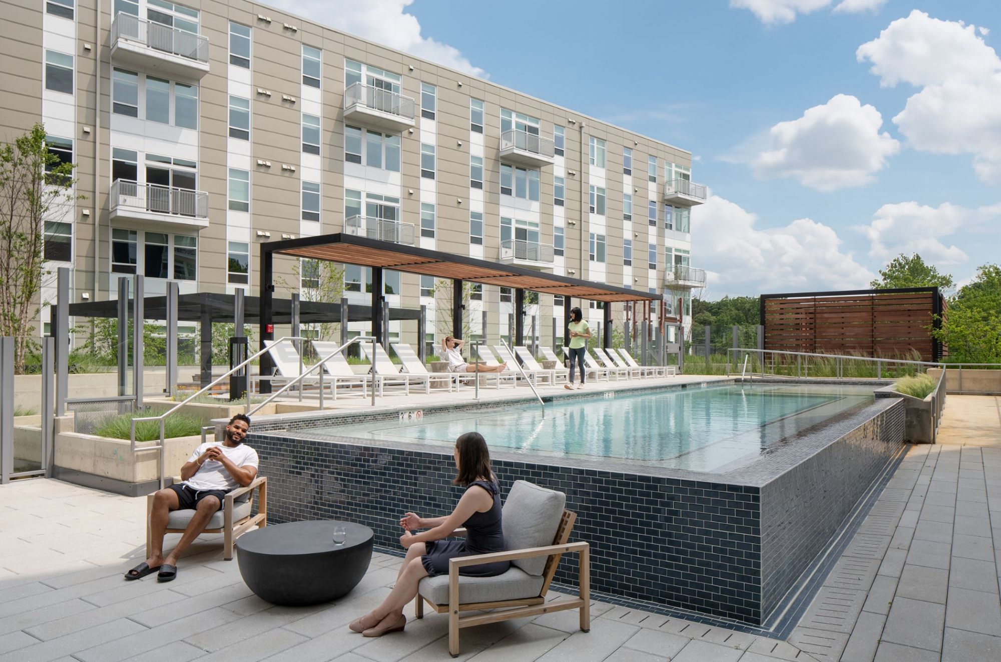 Aster : Landscaped pool deck with terraced gardens