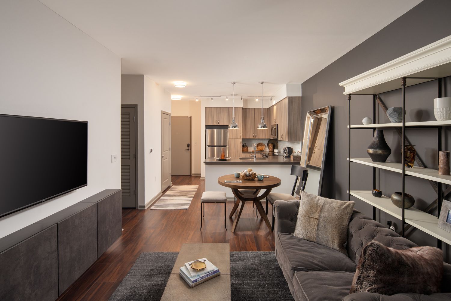 The Frasier : Charming entryways opening up to expansive, woodgrain living spaces