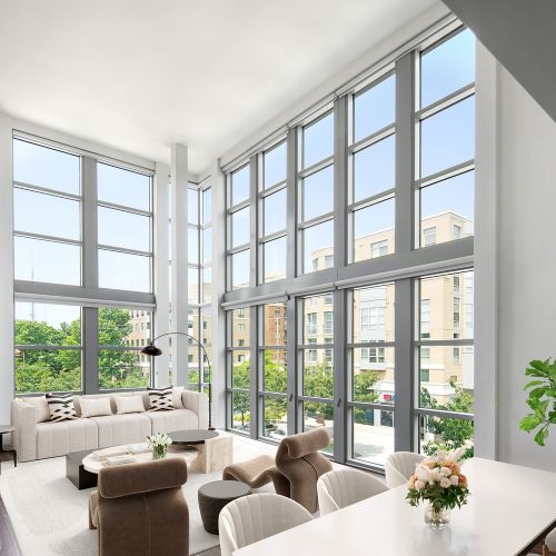 Lofts feature soaring two-story windows (in select residences).