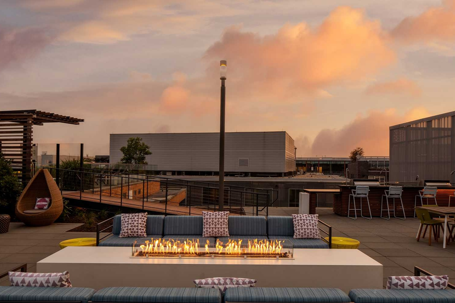 Insignia on M : Gather and mingle around the rooftop fireplace