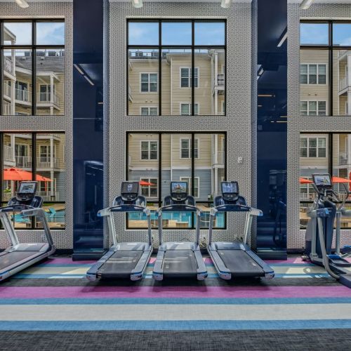 Cardio Equipment with a View of the Pool