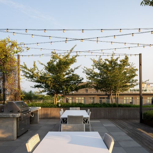 Savor the flavors of outdoor cooking in style at our rooftop grill.