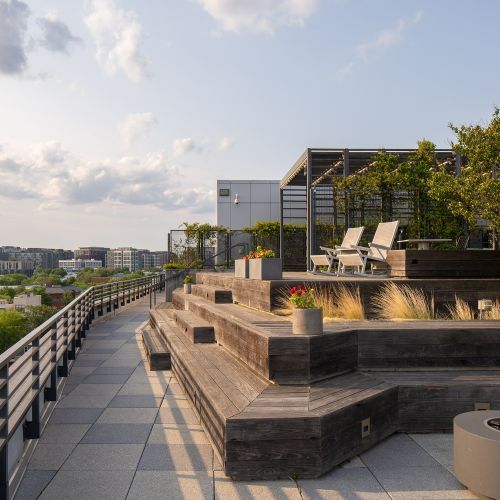 Elevate your outdoor lounging experience with our rooftop seating. 