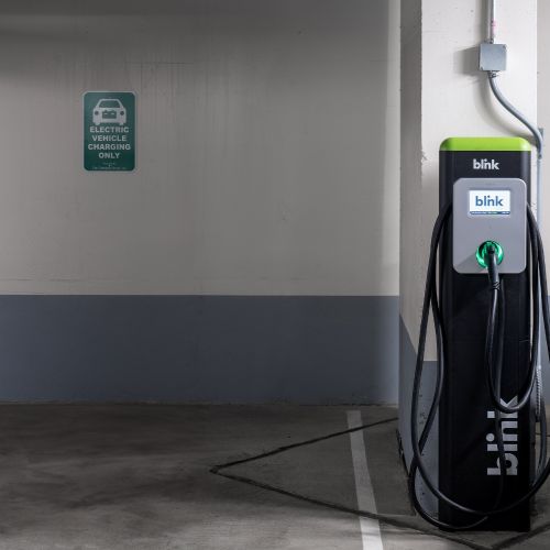 Discover the ease and efficiency of our apartment's electric vehicle charging station.